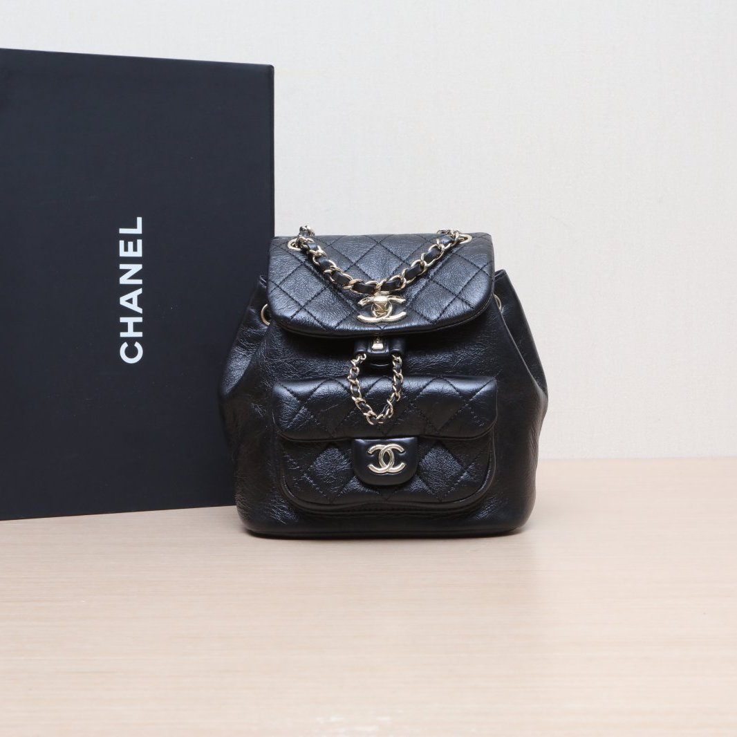 95新 Chanel/香奈儿 小花攀攀Duma 抽绳口盖双肩包小号皮革C 芯片