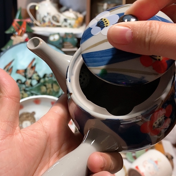 口沿有磕碰球口侧把壶