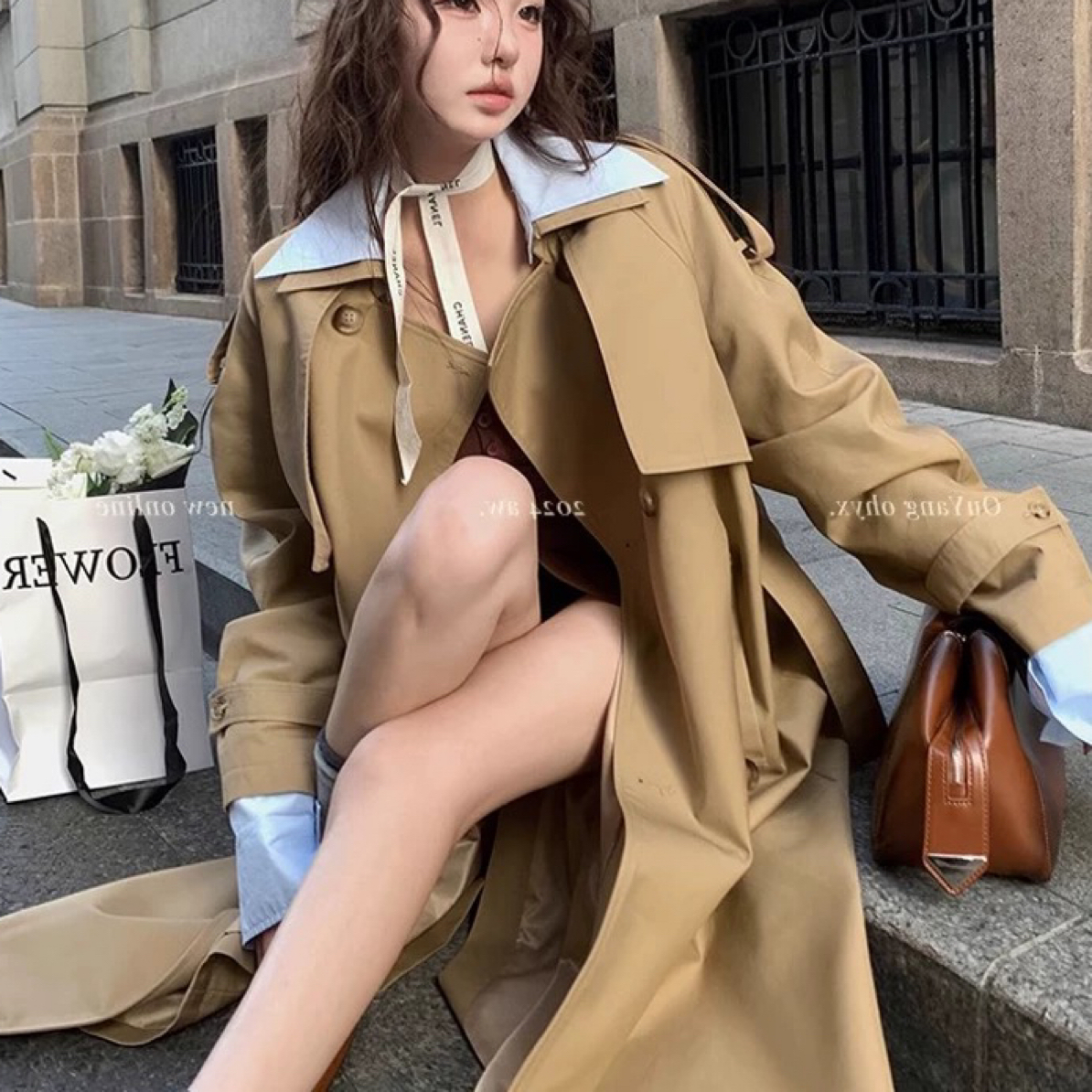 翻领双排扣风衣外套女秋季宽松高级感系带廓形中长款大衣