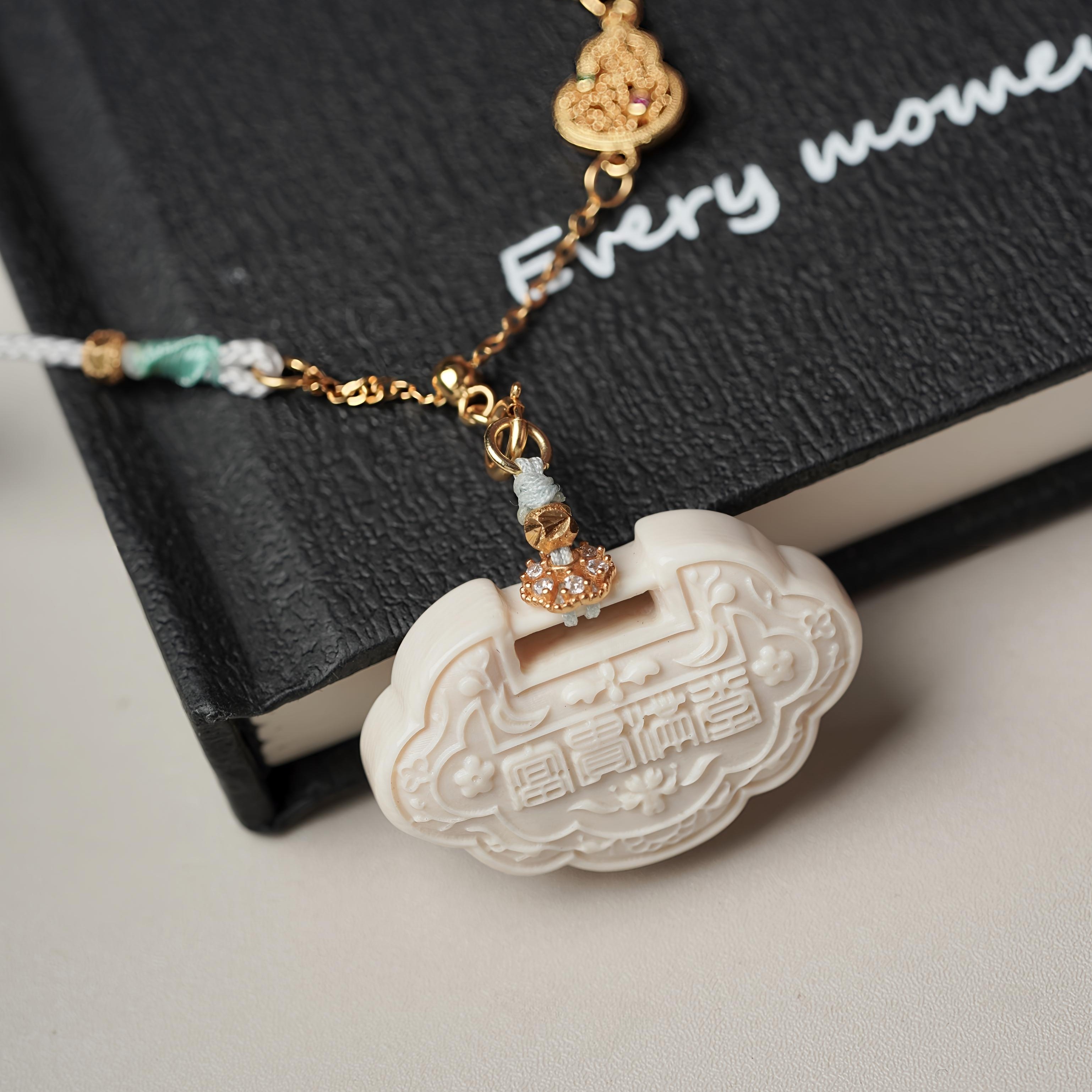 H13-65天然猛犸牙雕刻平安锁 约28.5x18x8.5mm一物一图 支持鉴定