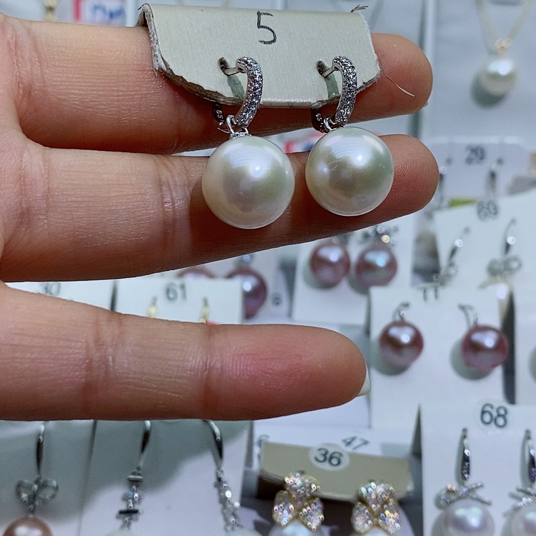 酒***羽淡水珍珠银S925镶嵌吊坠(赠链)