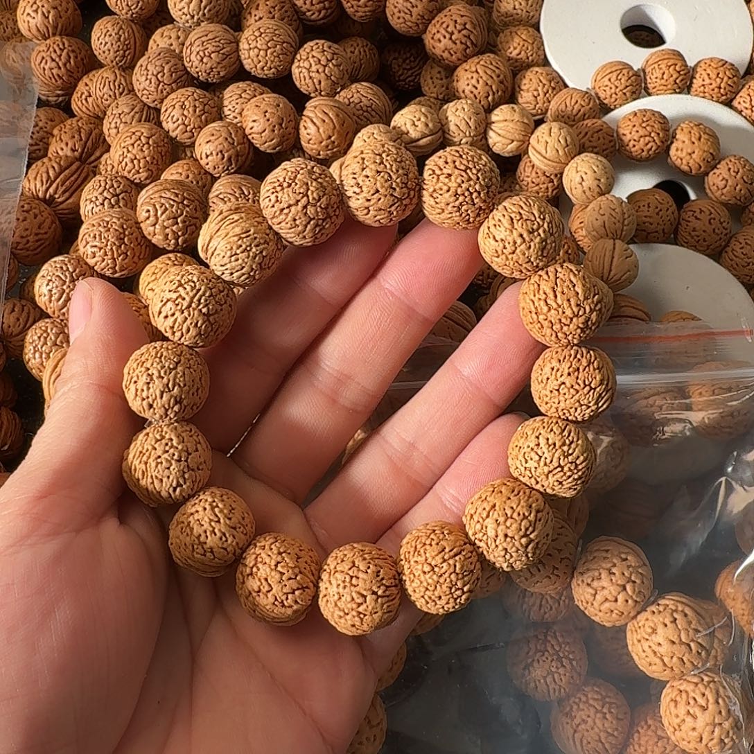 ****c吊坠桃核凤尾手串