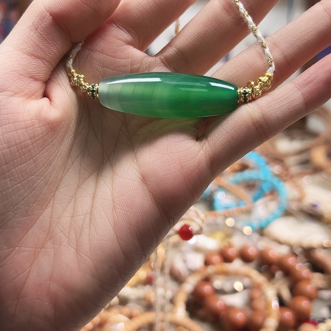 三***石吊坠龙脊菩提手串