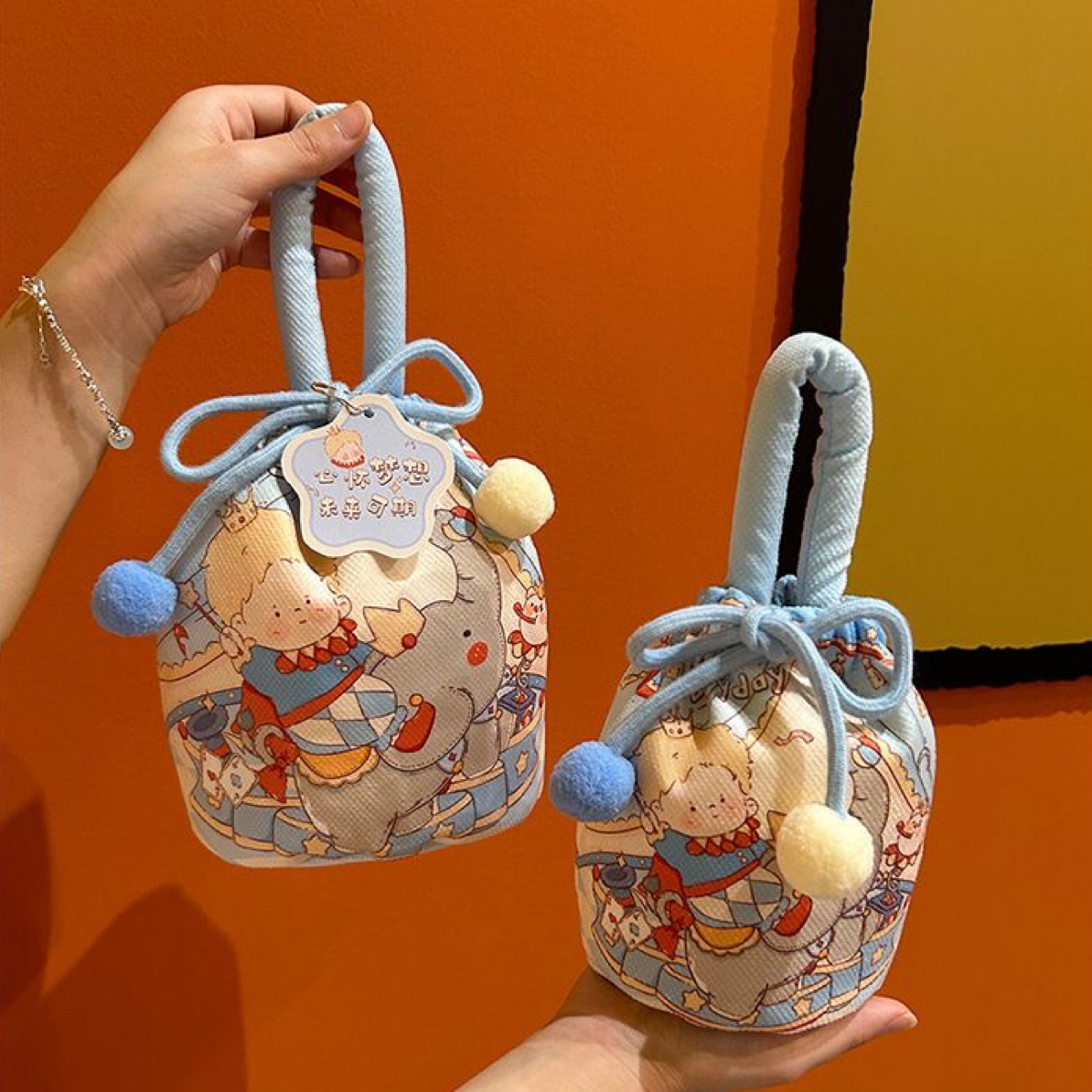 可爱束口水桶包包