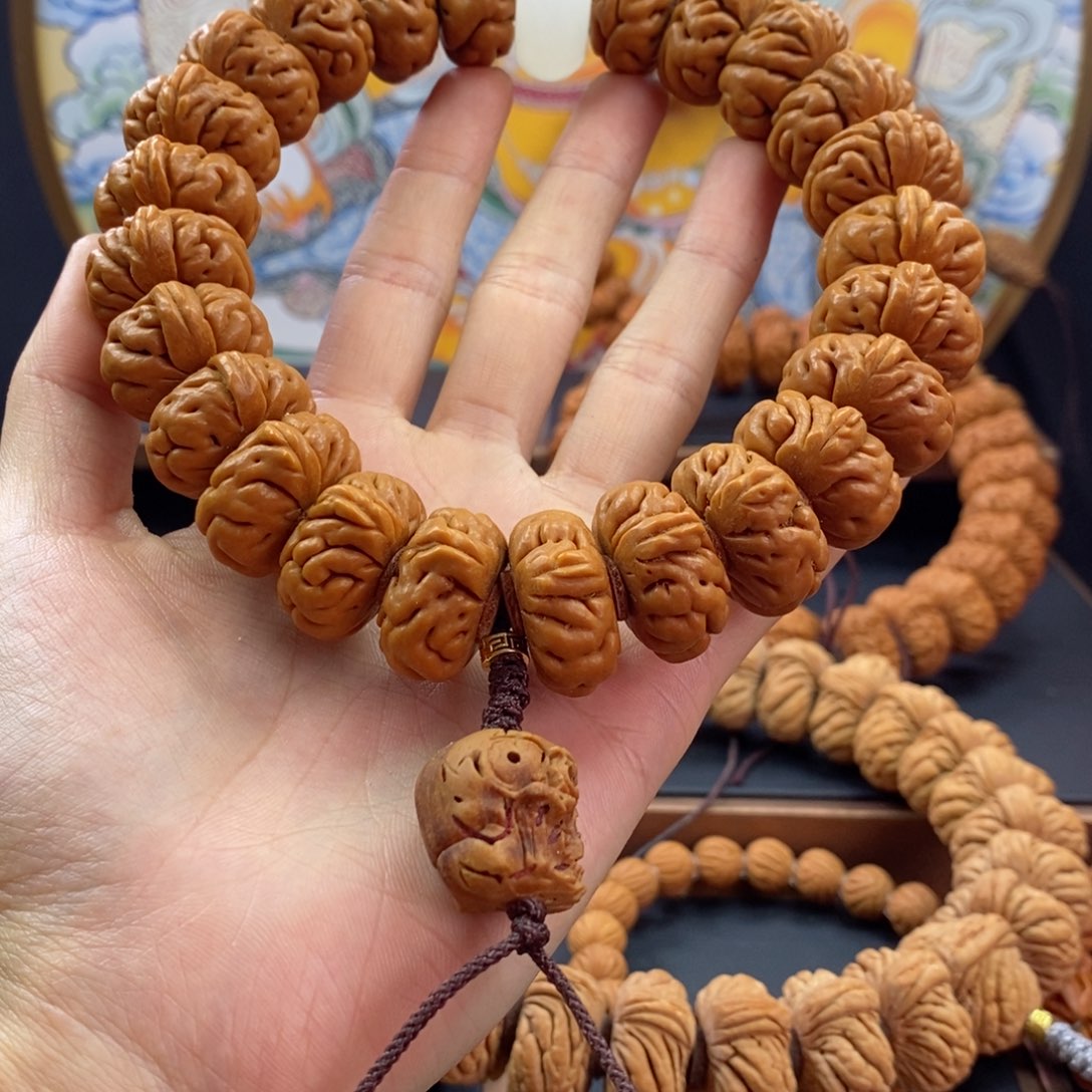 桃核手串S***﹏龙纹桃核白玉龙