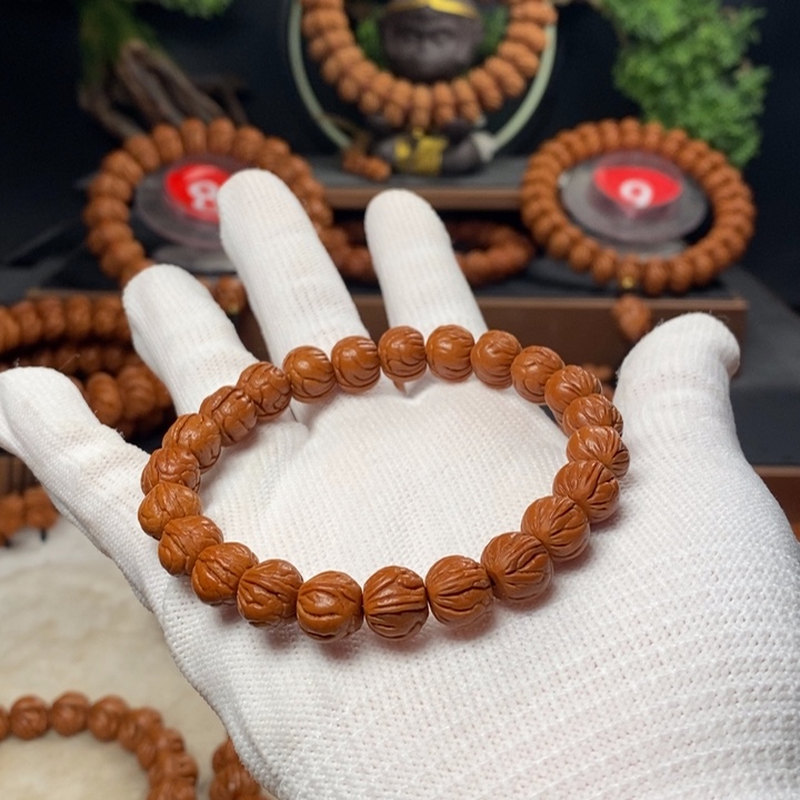 桃核吊坠那****路秦岭龙纹