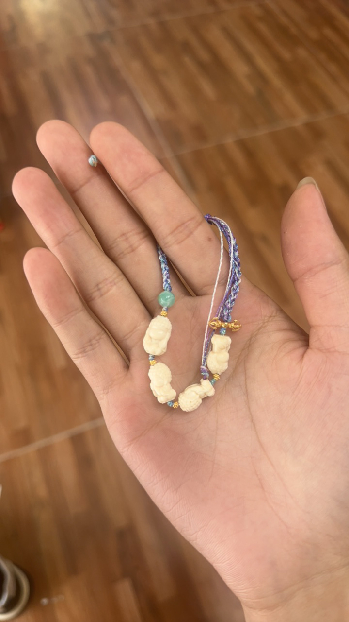 天然猛犸牙雕刻四不佛单圈手串