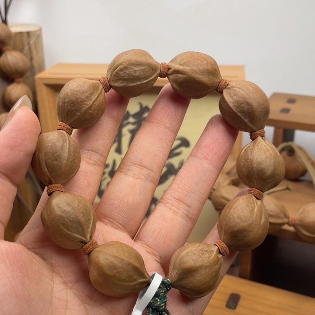 卑***原手串/手链橄榄核20.5*25梅林铁核