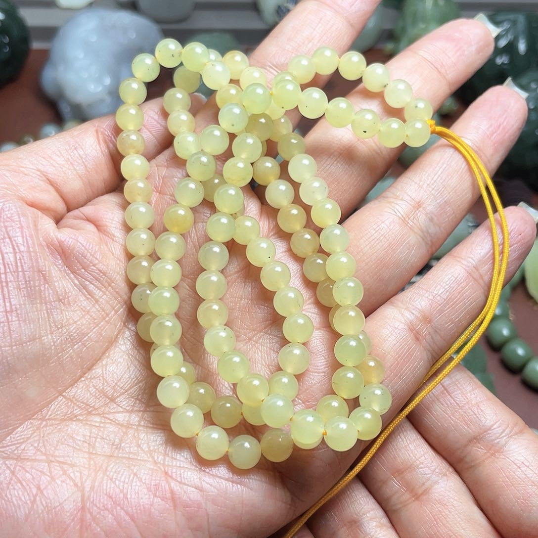 和田玉未镶嵌把件春*