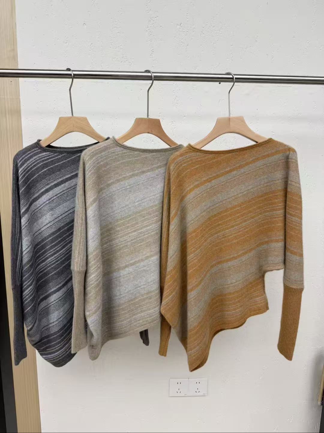 女款；25331不规则斜边毛衣