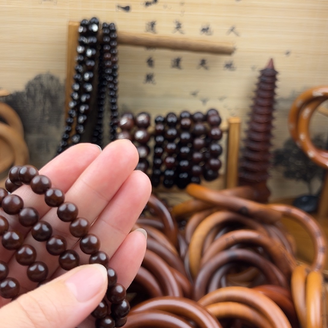 淡***z0.8内径枣木老料珠子108颗