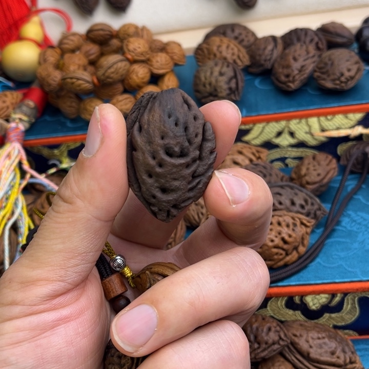 用***2木质非金属桃枭吊坠 桃枭吊坠