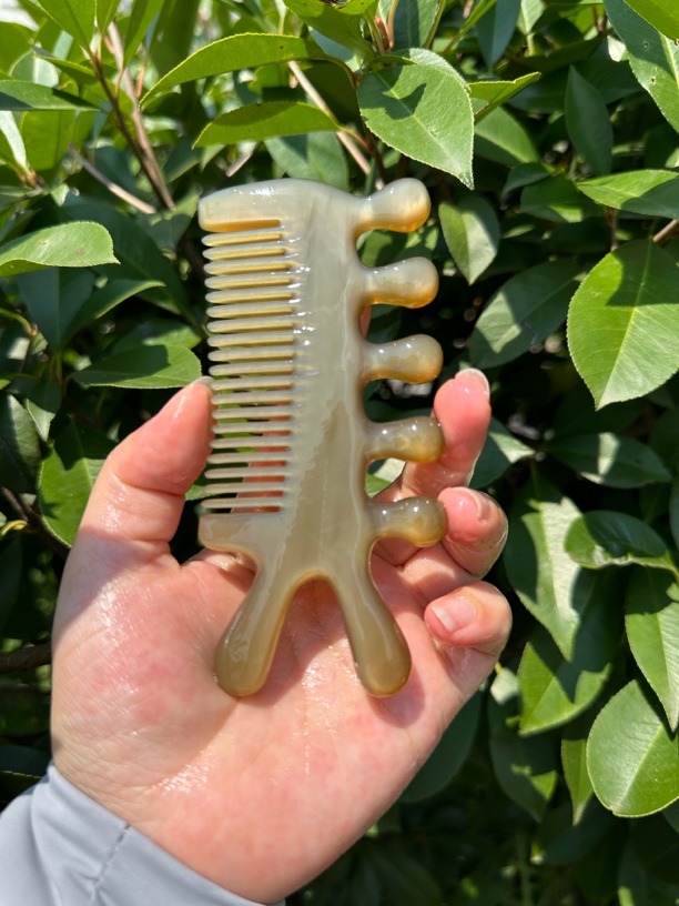 精品牦牛角多功能按摩水滴梳