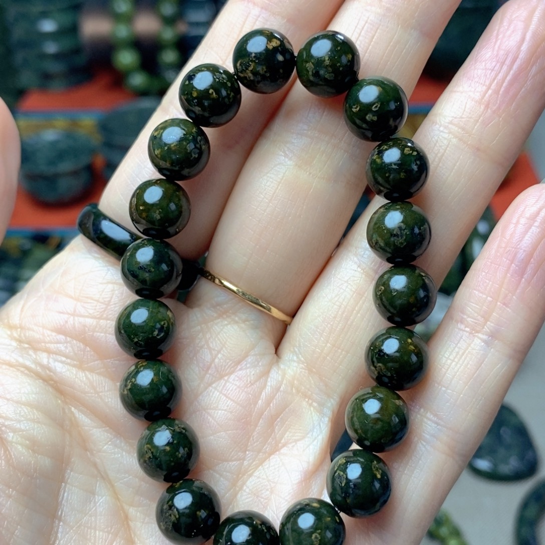 傅***毅蛇纹石玉未镶嵌药王石