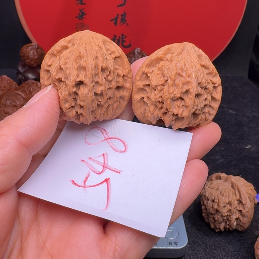 文玩核桃把件40红狮子