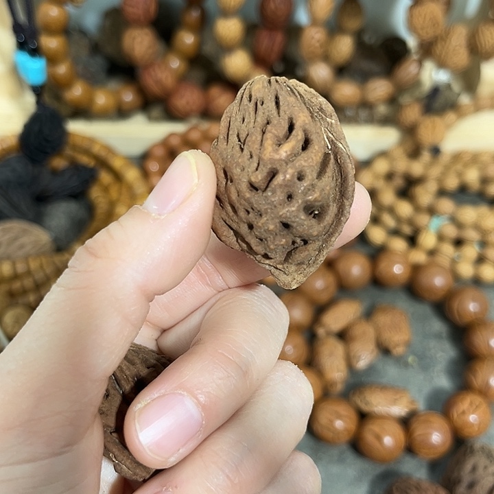 国***安核桃把件野生桃桃枭单籽精品