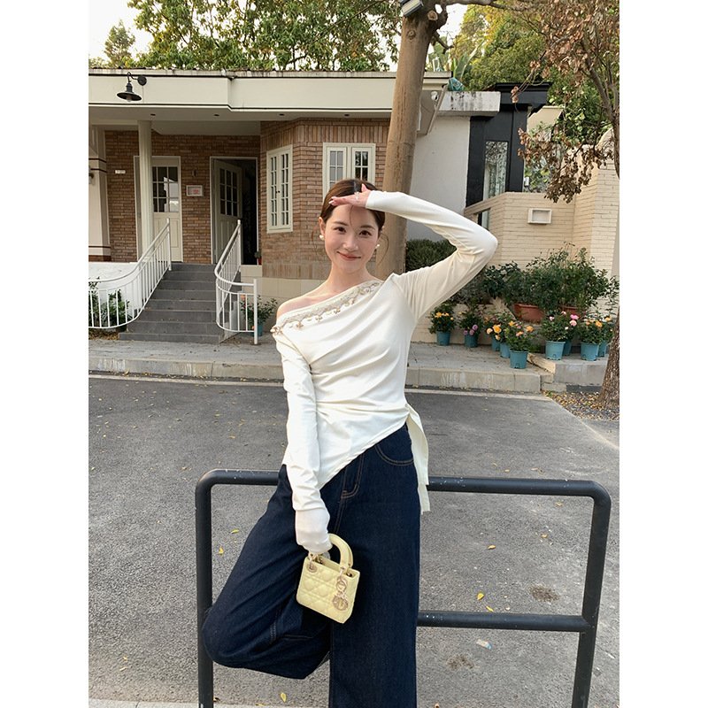 02.24十三行早春2025春季法式纯欲甜辣设计感斜领露肩女C3230