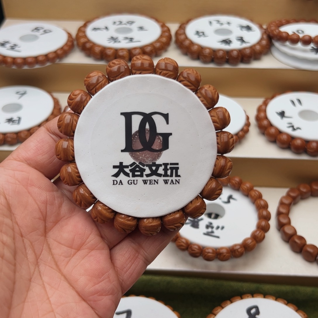 桃核手串至**渝桃核手串