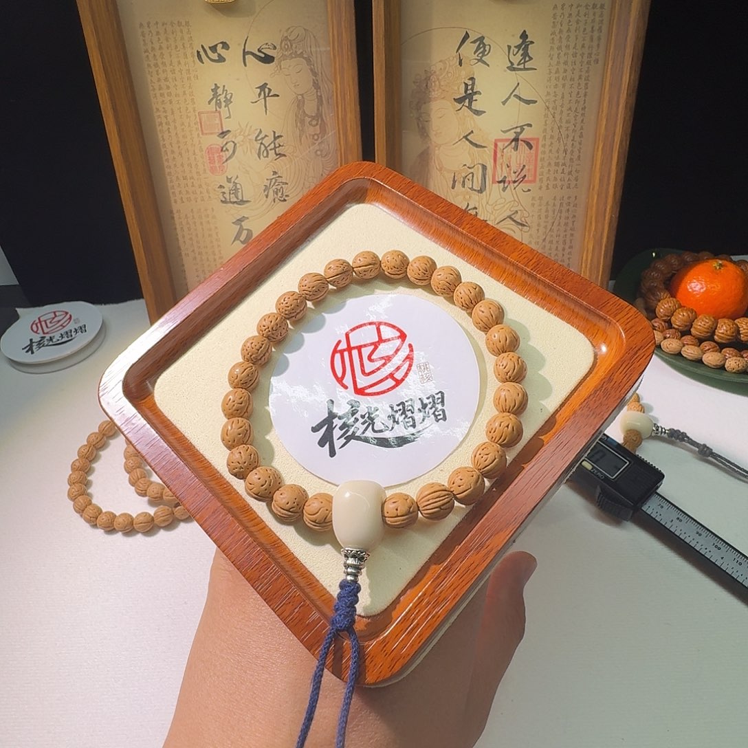 陈***汐吊坠桃核野生小黄桃