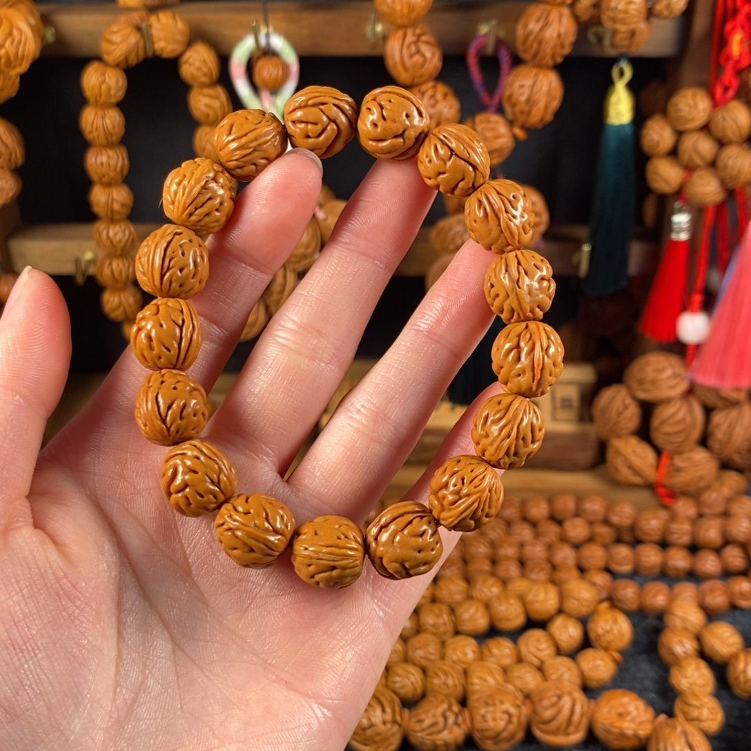 吊坠桃核桃枭手串