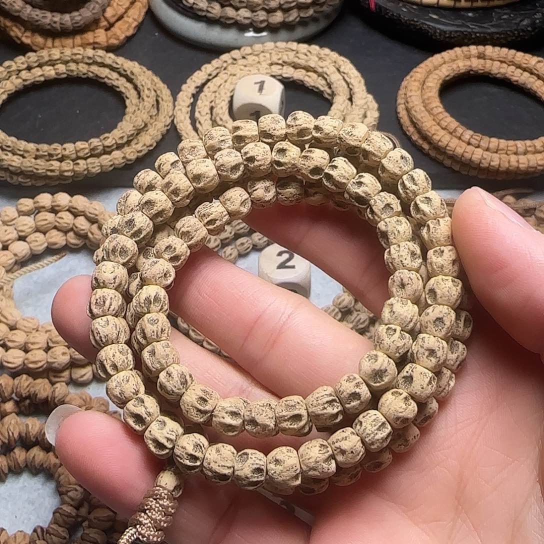 柏香籽/百香籽手串霸*对眼鬼脸