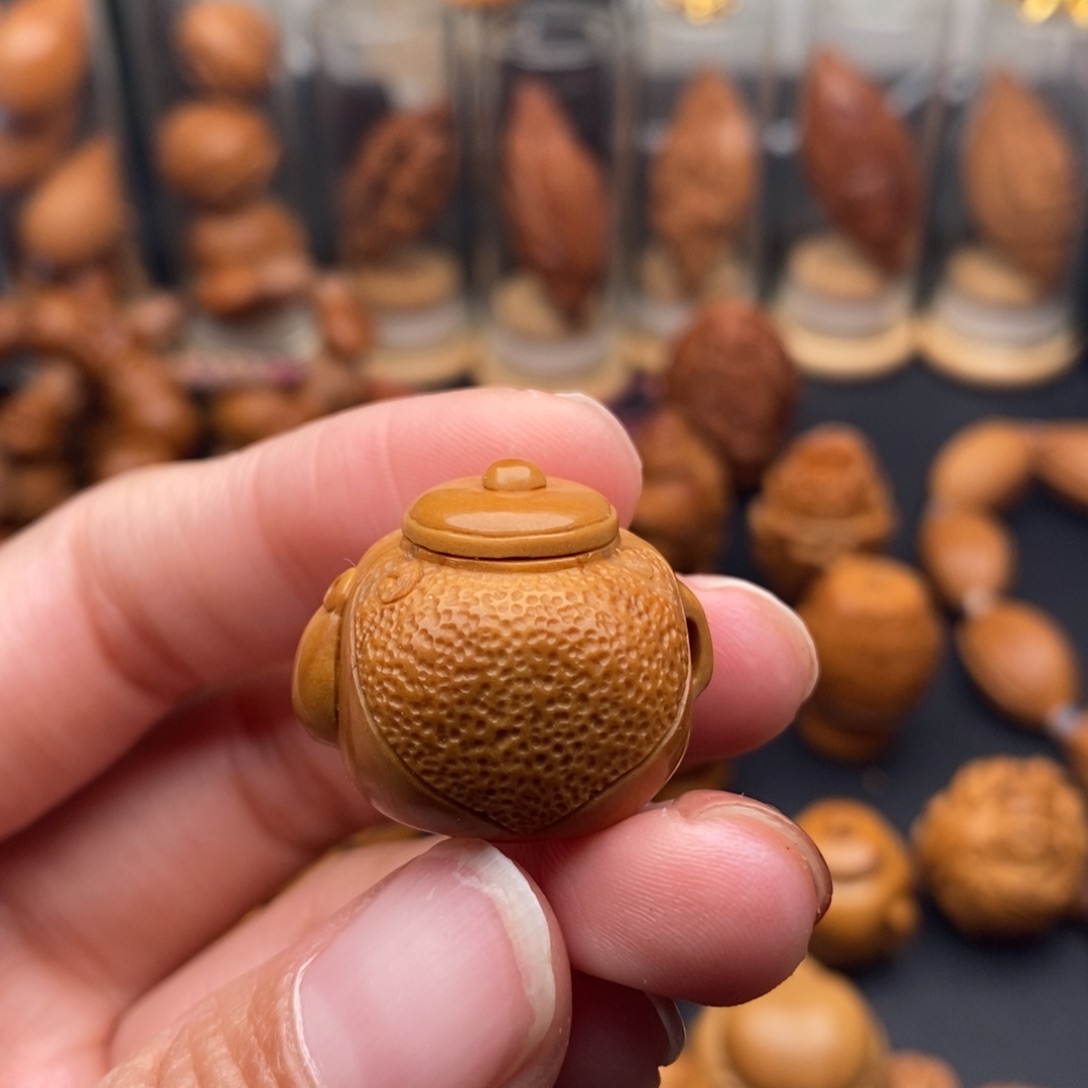 尘***军橄榄核吊坠小茶壶