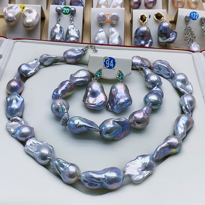 银S925镶嵌淡水珍珠耳饰丽****姐