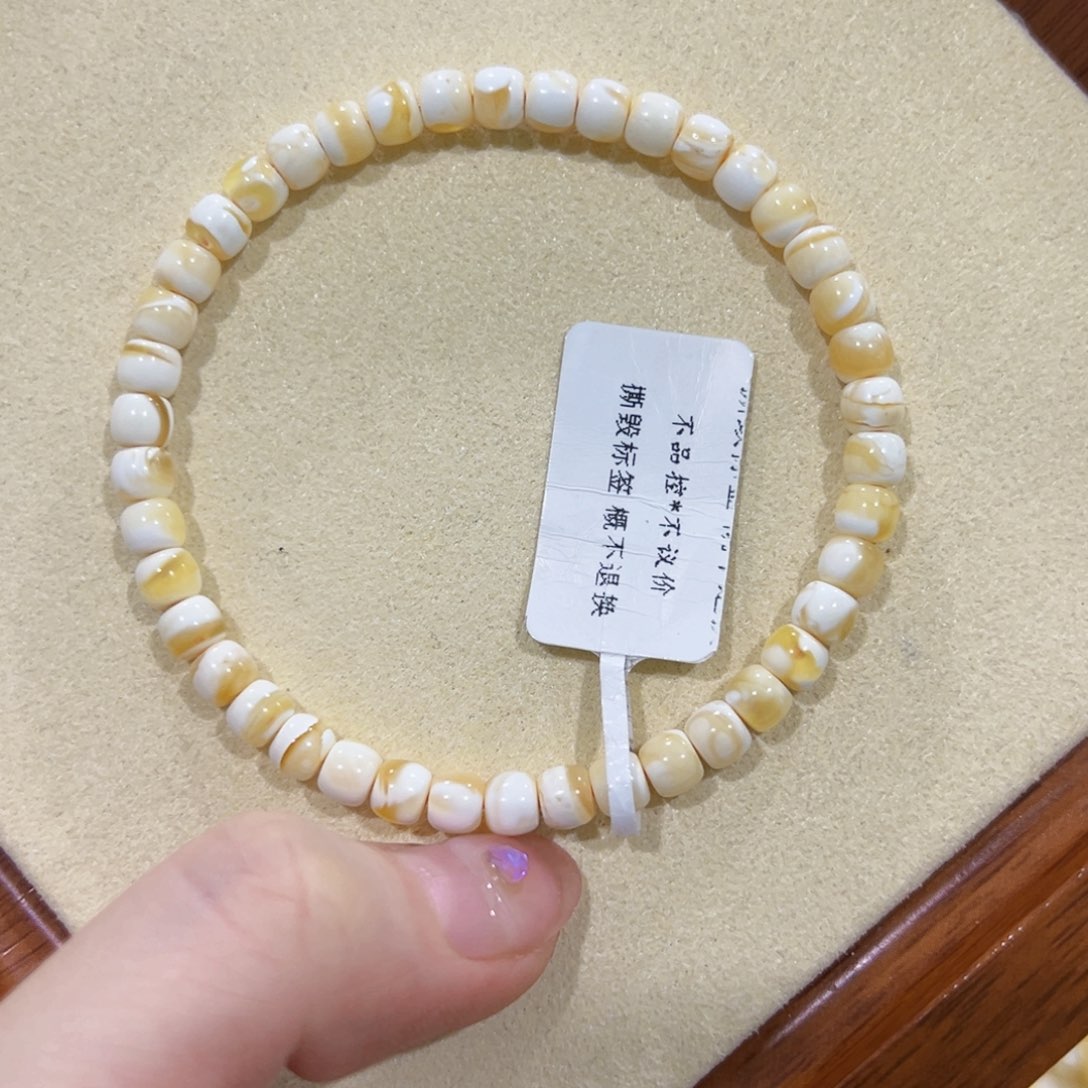 蜜蜡手链未镶嵌张*柱5m金漆白妖孽