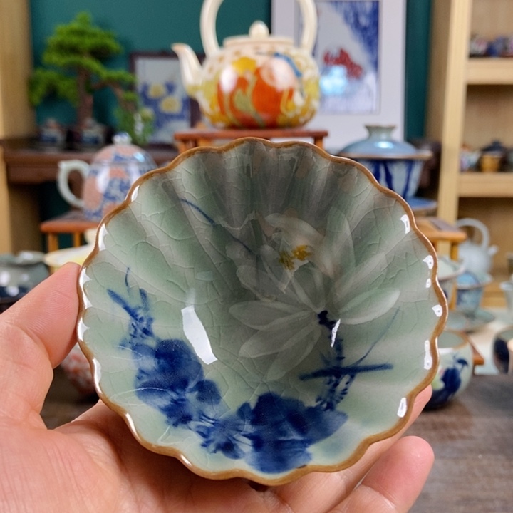 瓷片手工制作工艺精湛等特点为