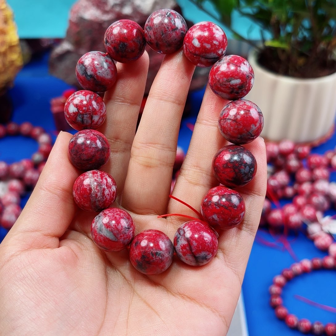 天然辰砂网*界天然原石手串