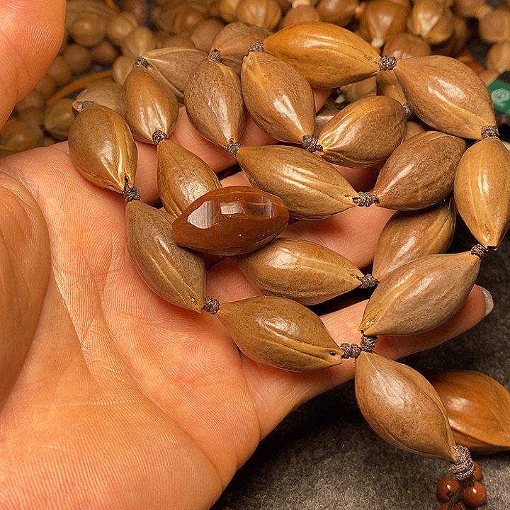 橄榄核手串1.5紫肉脖挂50号