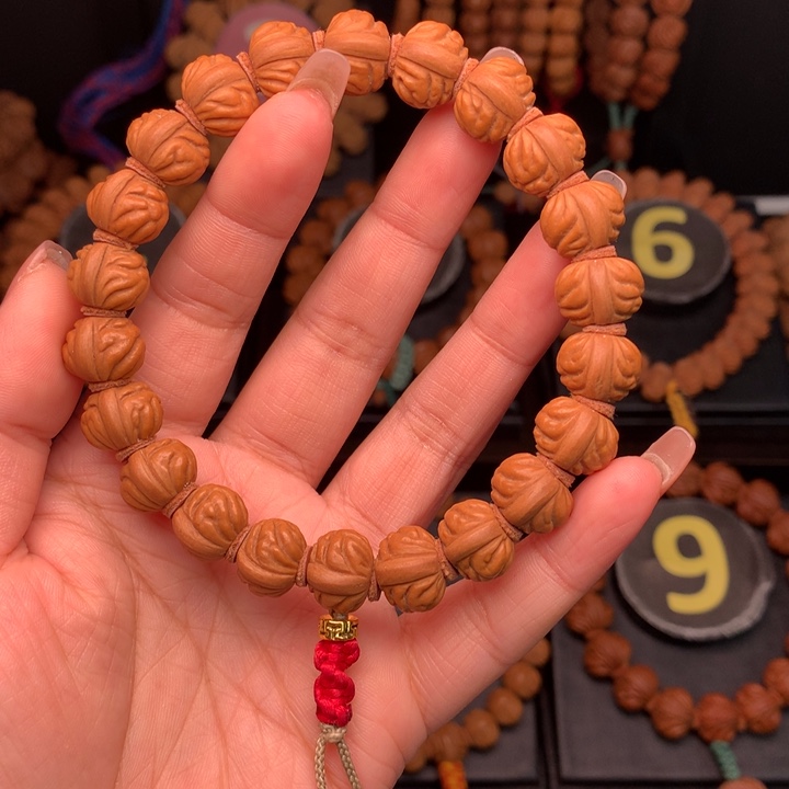 桃核吊坠1.4野生红莲手串