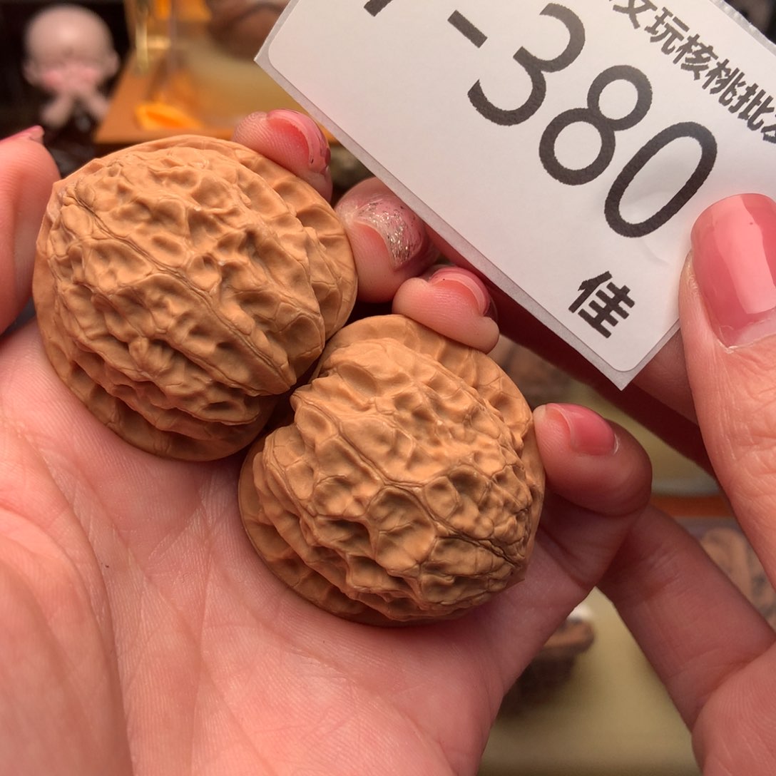 文玩核桃把件38金牛