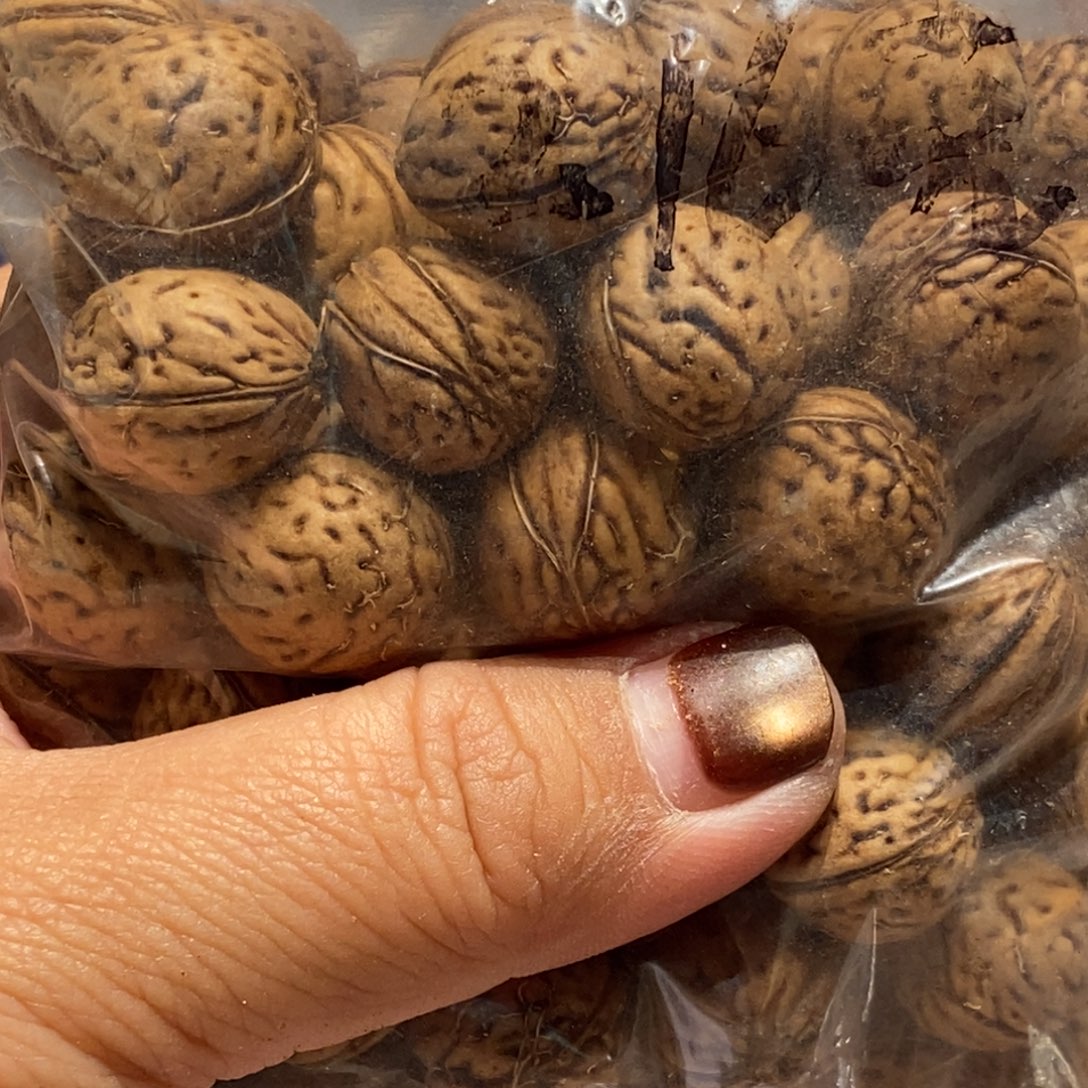 哈***尼吊坠桃核215克散装卡15