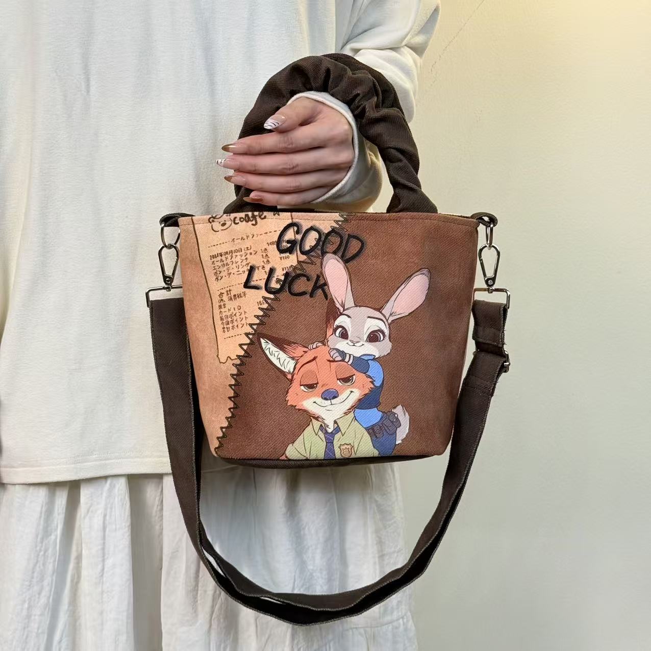 可爱插画褶皱手拎水桶包可斜挎单肩包休闲日常百搭手提妈咪包新款