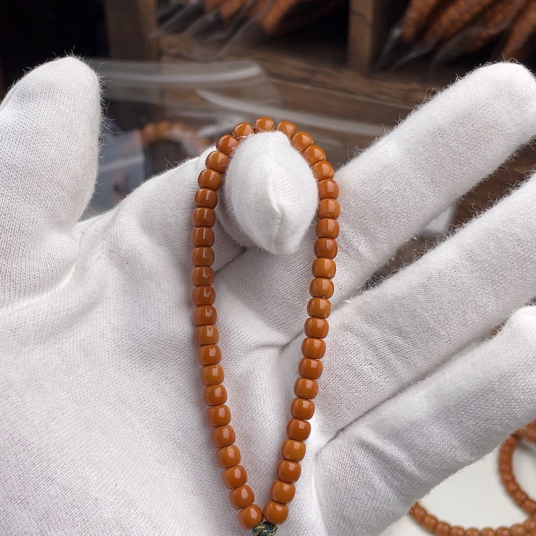 橄榄核把件老挝核核尖手持福利