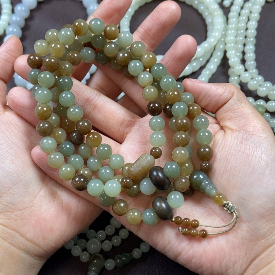 和田玉未镶嵌把件手持