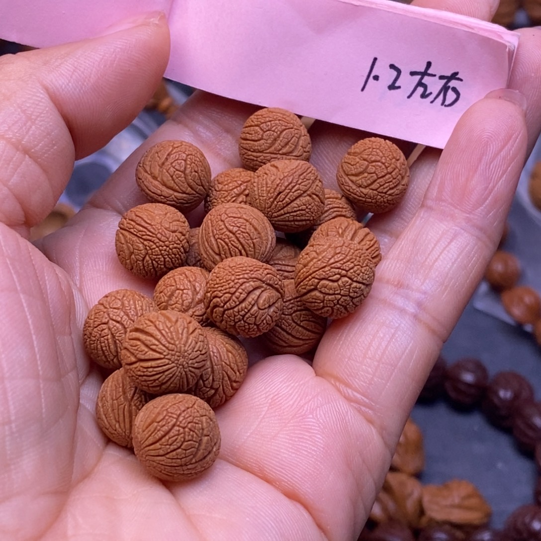 赵***宁秦岭龙纹桃核54颗