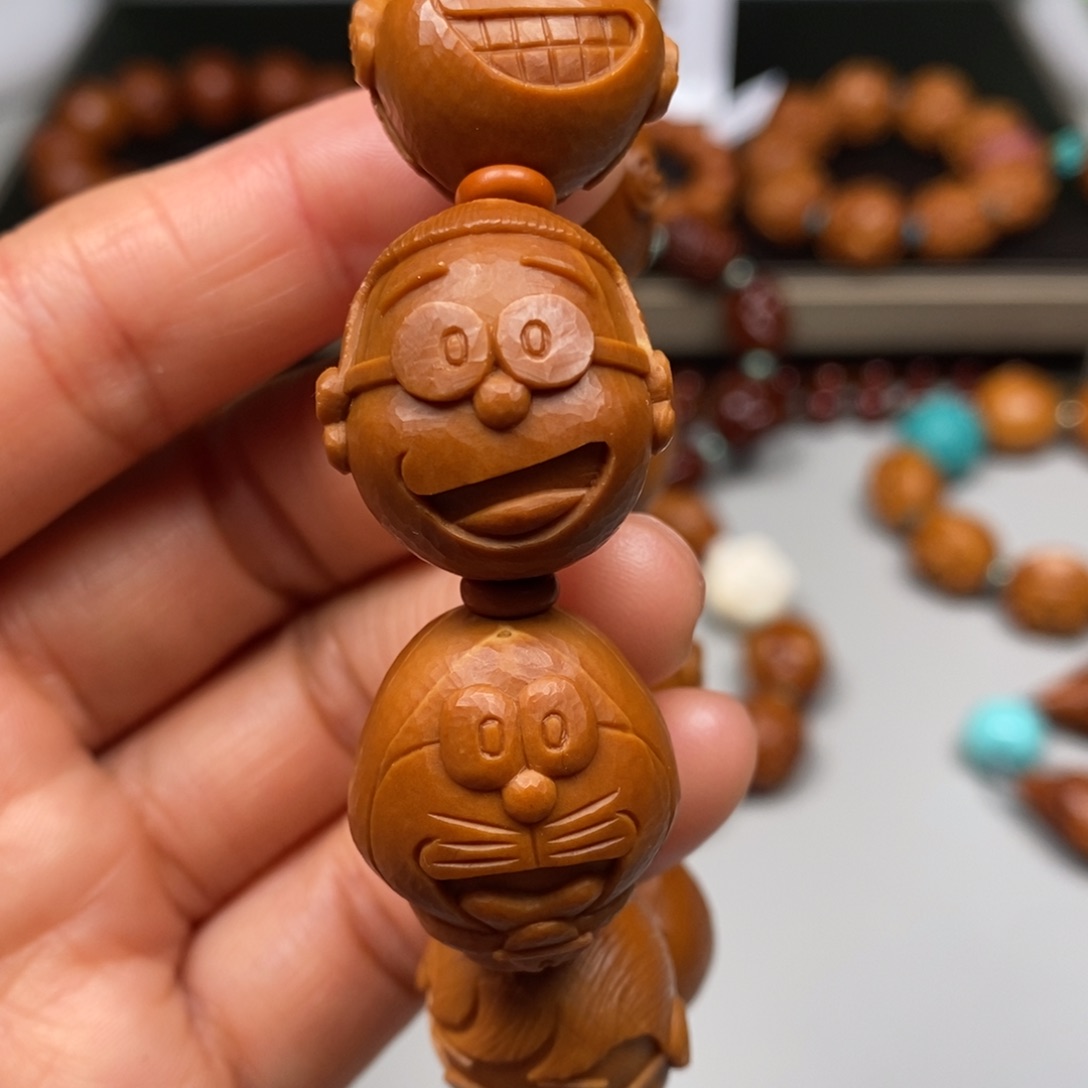 橄榄核吊坠机器猫手串
