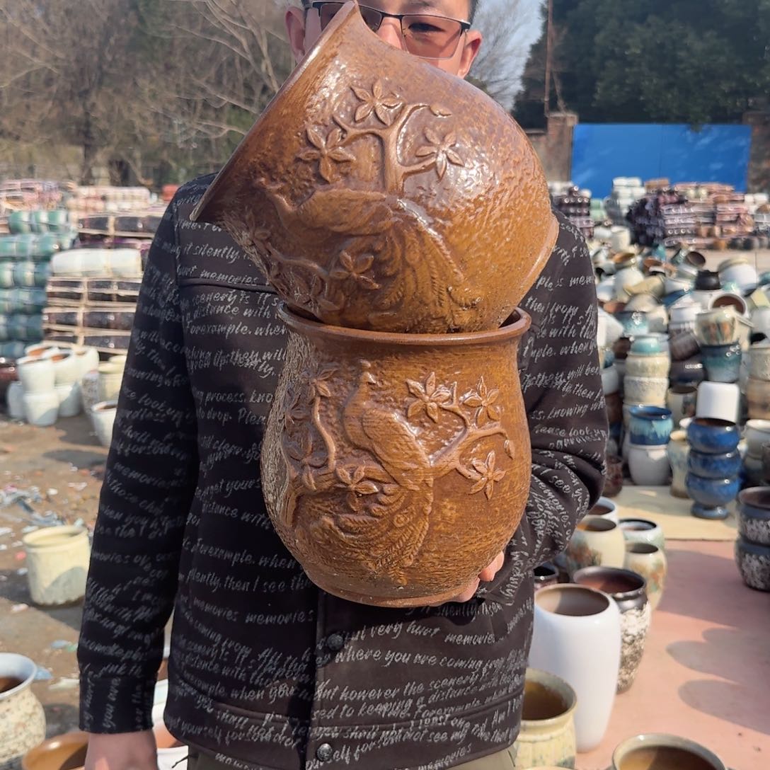 紫砂花盆口18高21（两个孔雀柴烧