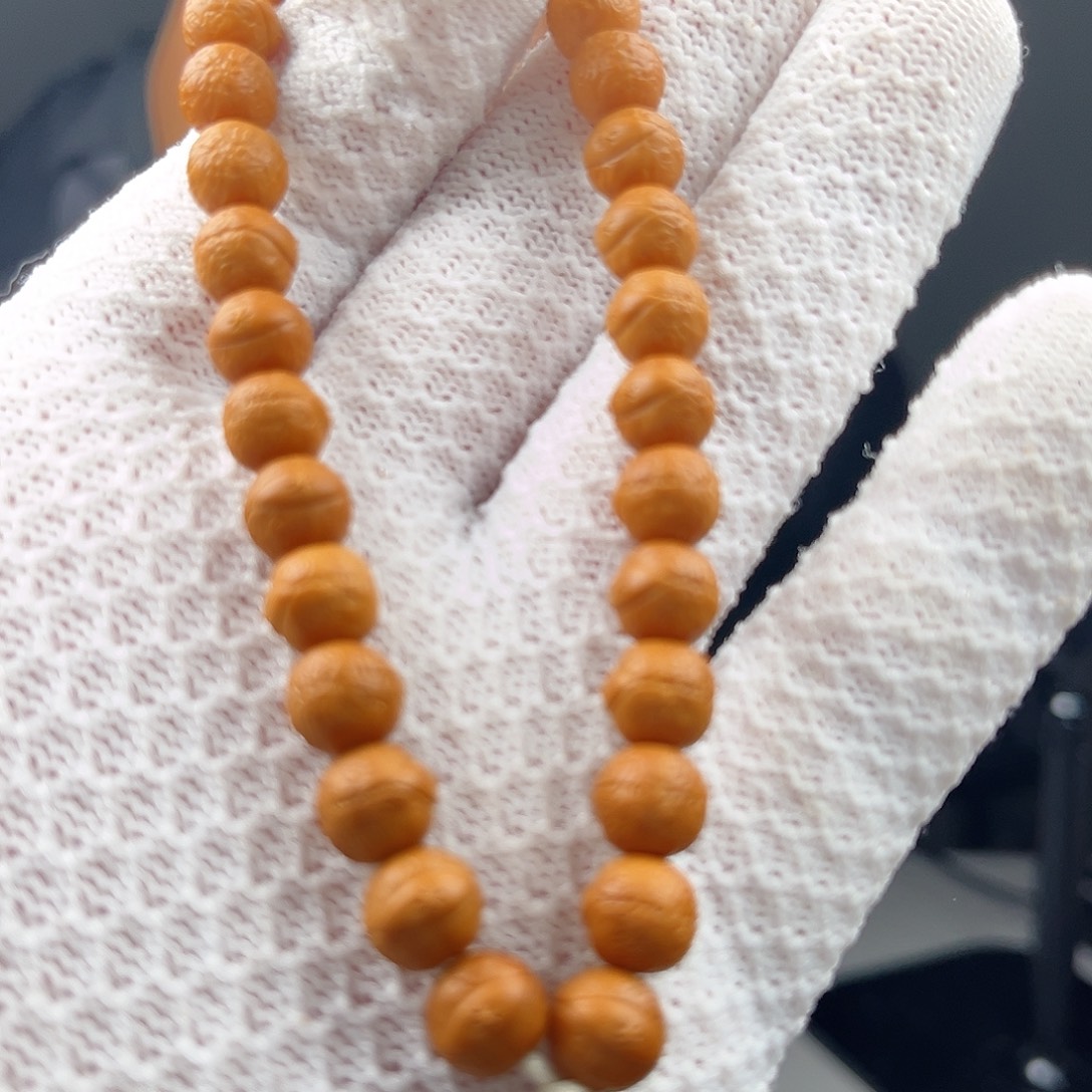 梁***欣猴头核桃手串凤眼