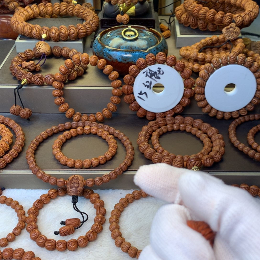 聚***罗桃核手串秦岭龙纹