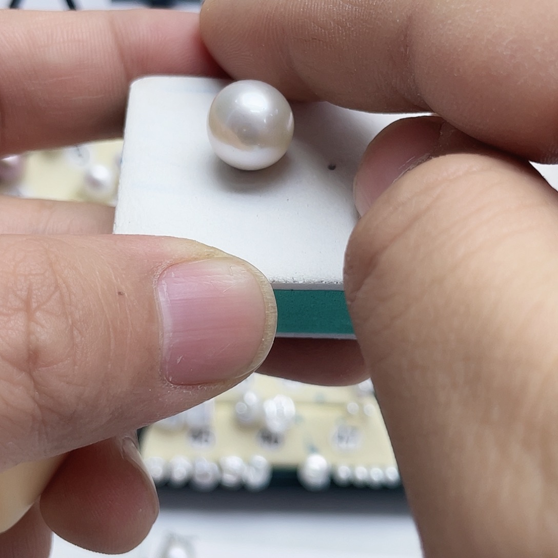 未***呀淡水珍珠银S925镶嵌耳饰