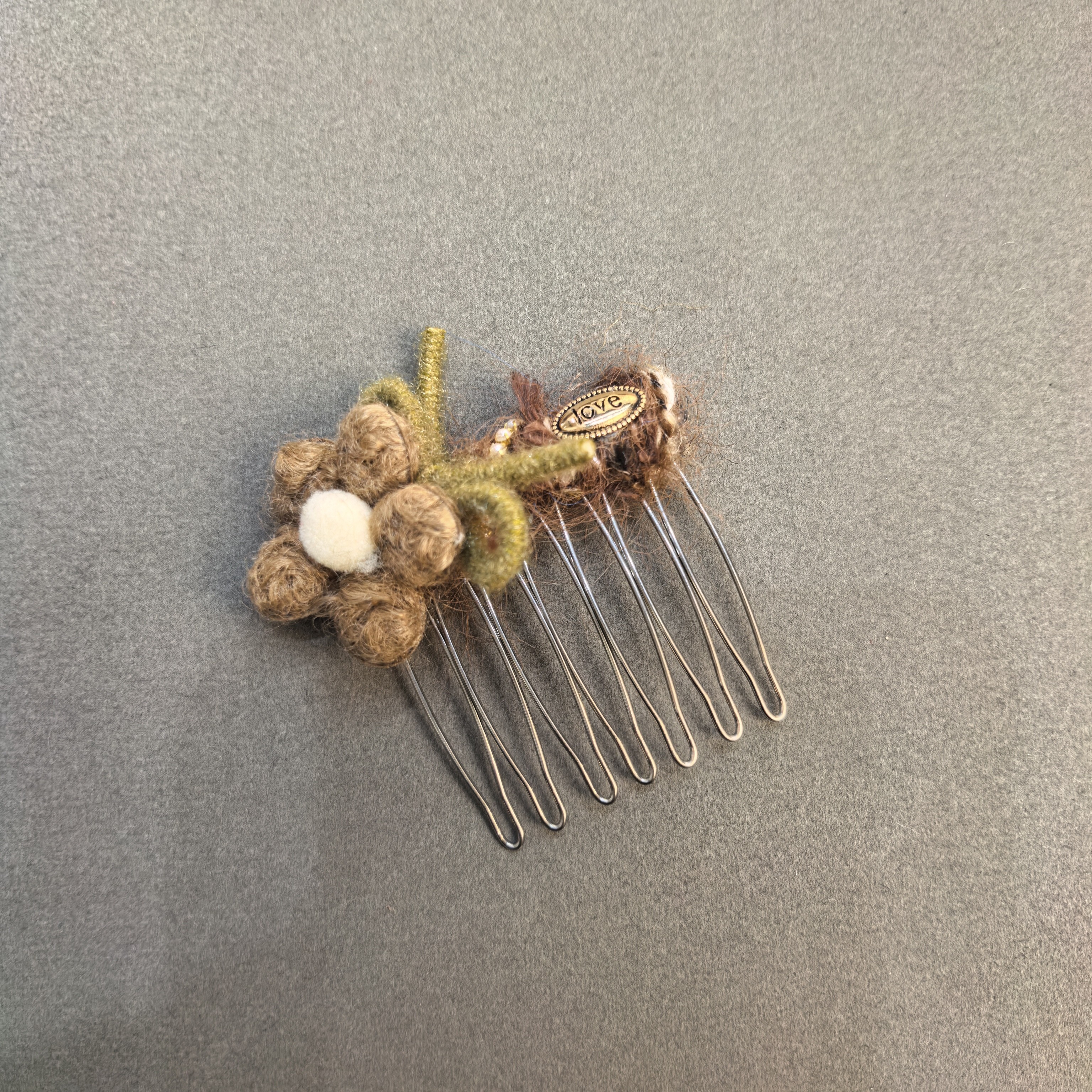 E627咖色花朵蝴蝶结插梳