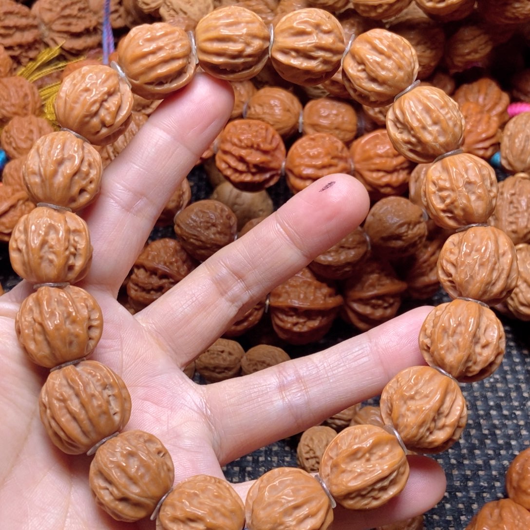 桃核手串树王手持