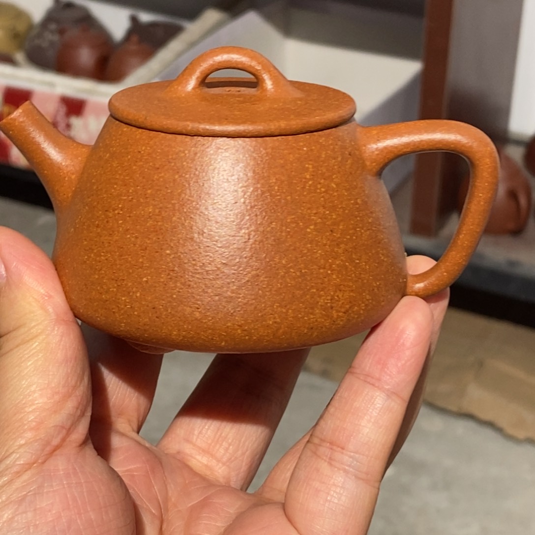 紫砂公道杯紫砂壶。紫砂壶