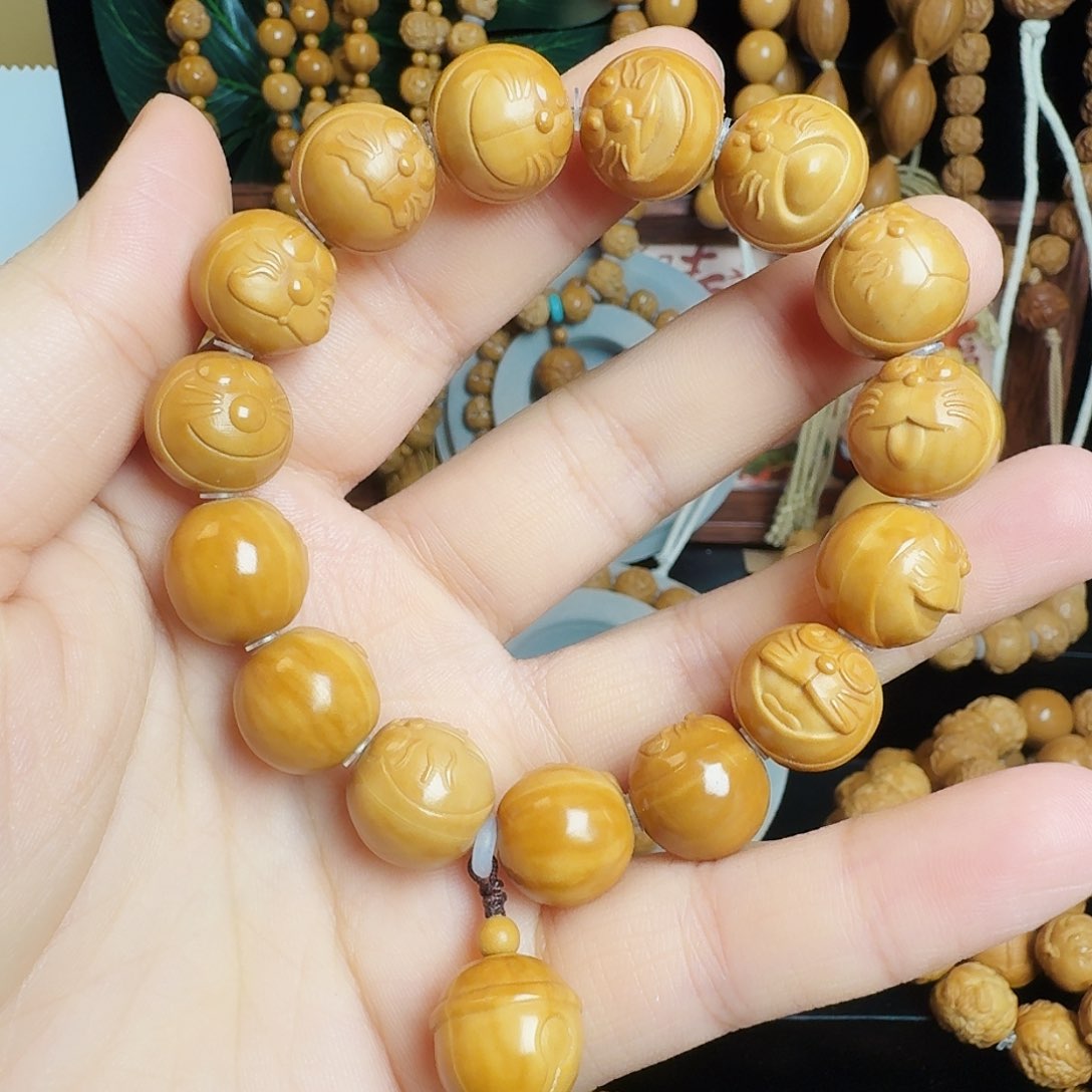 橄榄核手串G***e多啦Ａ梦手串
