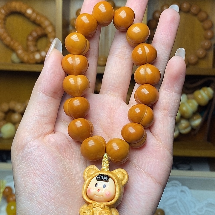 吊坠猴头核桃屁桃手持卡15多妹