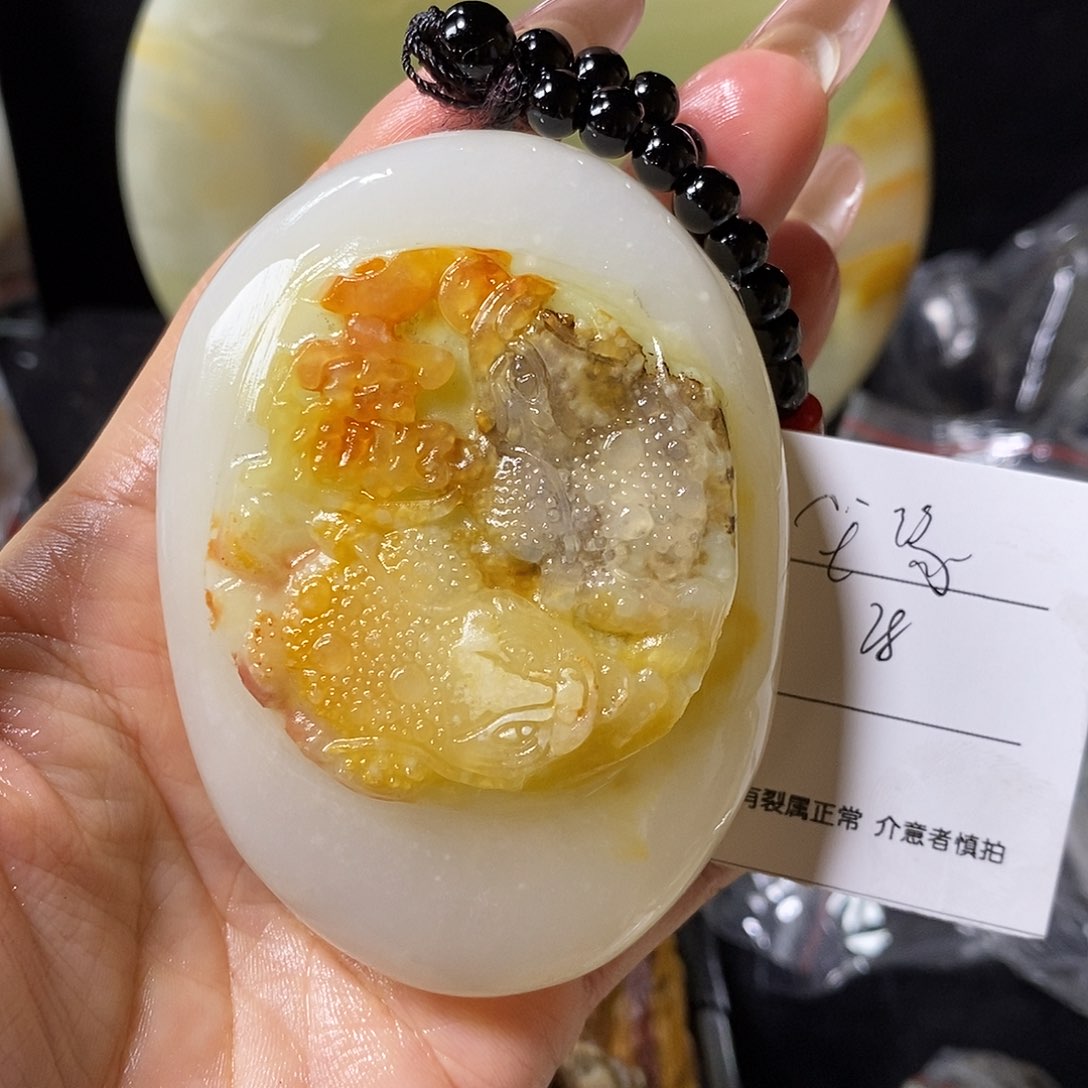 石材尘**梦古青石手把件