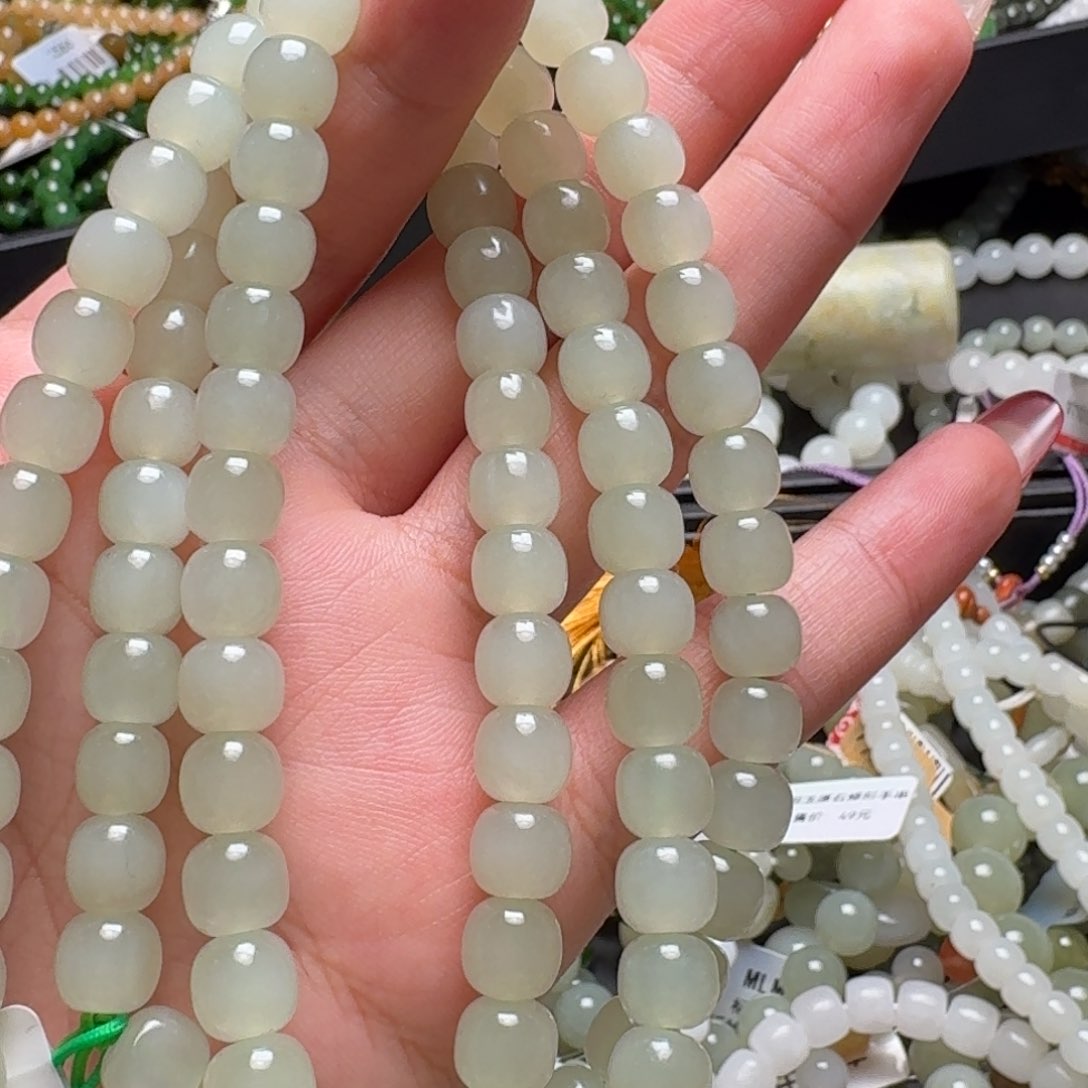 蛇纹石玉把件合金